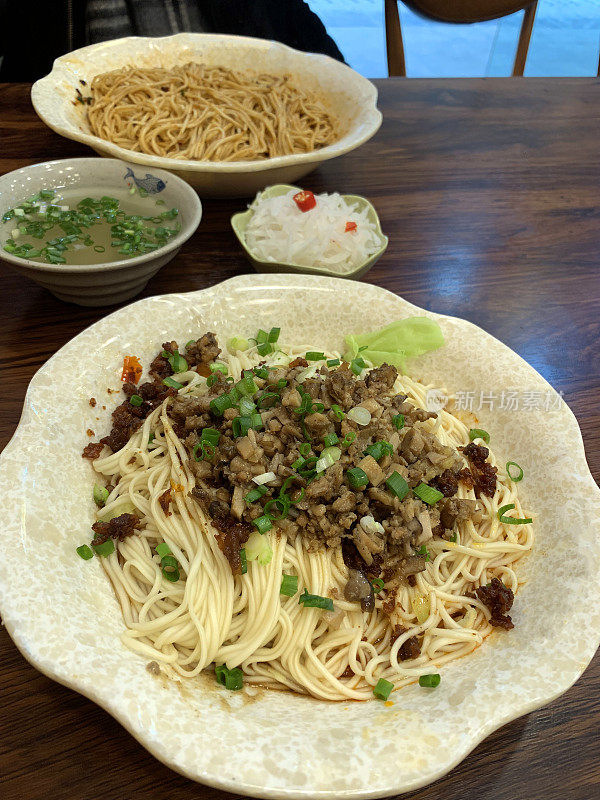 Minced pork noodles with chili oil sauce (臊子面) with the sichuan kimchi and soup